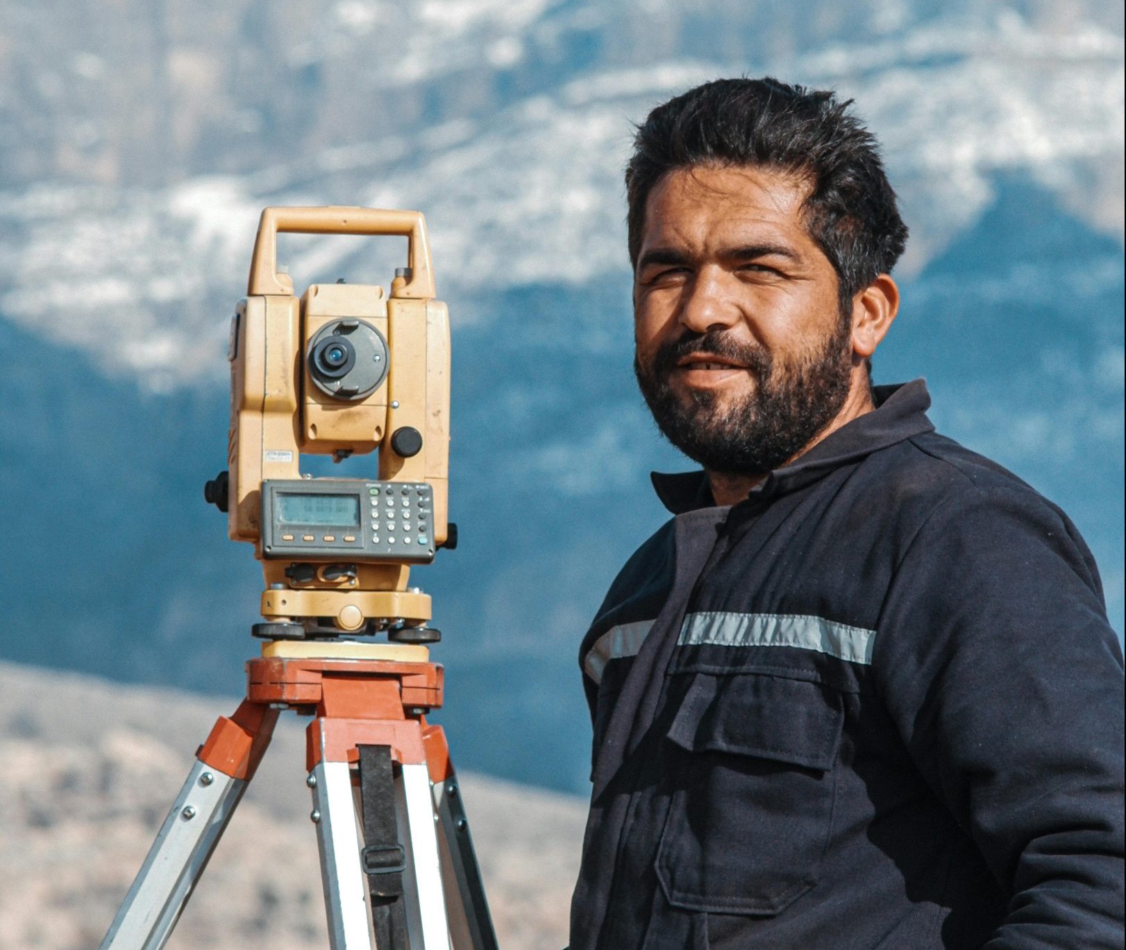 a land surveyor and his tools