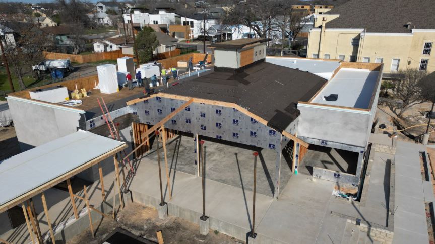 Construction Progress Monitoring by AnDRONErson Aerial Imagery