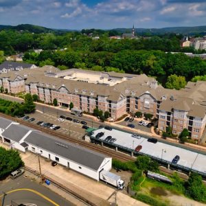 Aerial view of residential real estate in Weston for sale.