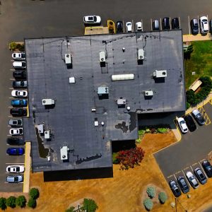 Drone pilot capturing stunning aerial views of Weston, CT real estate properties.