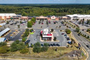 Aerial View of Busy Shopping Center and Restaurants