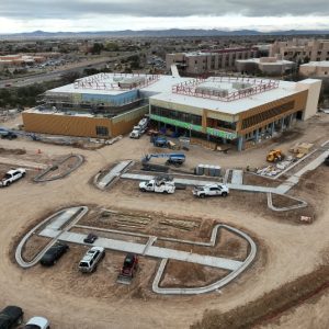 Drone surveying construction sites for project monitoring and management.