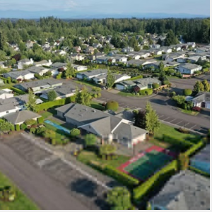 Stunning aerial view of residential real estate in Washington by Morlo Aerial Imaging.