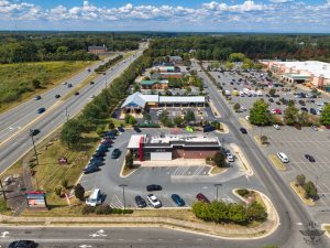 Aerial View of Busy Suburban Shopping Plaza