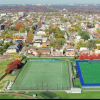 Aerial View of Urban Sports Fields and Neighborhood