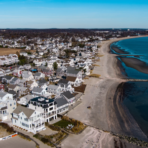 Aerial view of a beachside property ideal for real estate sales.
