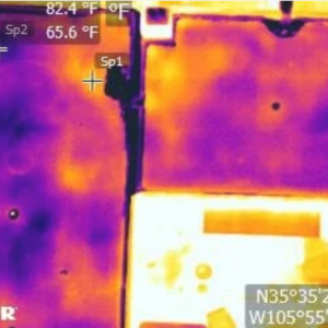 Aerial view of infrared inspection technology for building assessments and maintenance.