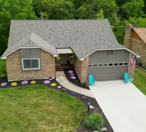 Aerial view of prime real estate showcasing property layout and surrounding landscape.