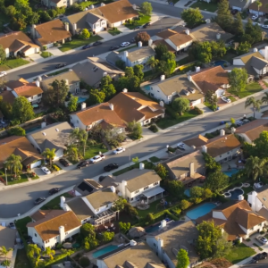 Aerial view of a beautiful real estate property showcasing expansive landscapes and homes.