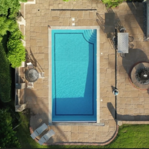 Aerial view of a beautiful real estate backyard captured by drone photography.