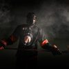 Fiery Hockey Player in Dramatic Arena Smoke
