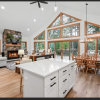 Open-Concept Living Room With Stone Fireplace