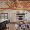 Rustic Living Room With Stone Fireplace