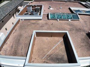 Aerial View of Gravel Rooftop With HVAC Units