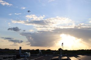 Drone Over Solar Rooftop at Golden Sunset