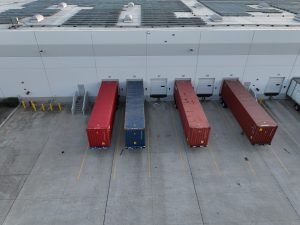 Warehouse Loading Docks With Shipping Containers