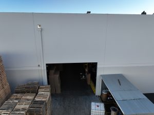 Warehouse Loading Dock With Stacked Pallets