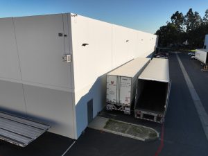 Modern Warehouse Loading Docks With Trucks
