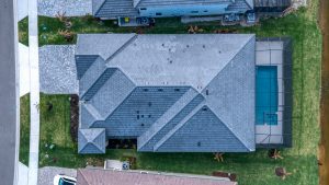 Aerial View of Suburban Home With Pool