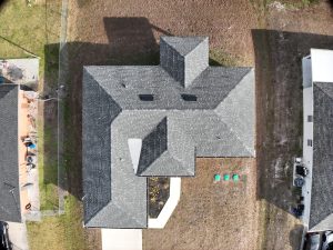 Aerial View Of Modern Suburban Home And Yard Shot With A Drone