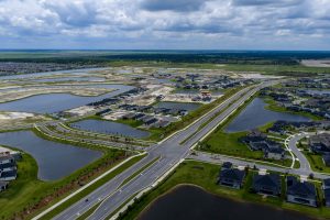 Aerial View of New Suburban Homes and Ponds