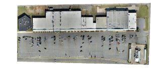 Aerial View of Suburban Shopping Center Parking Lot