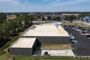 Modern Commercial Building With Large Parking Lot