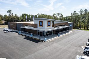 Modern Discount Grocery Store Parking Lot Aerial Photo