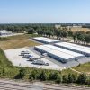 Rural Storage Facility With Containers and Trucks