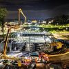 Night Construction Site With Steel Frame and Concrete Pump